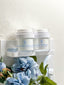 Nutrition cream surrounded by fresh flowers