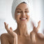 A woman applying an anti wrinkle cream to her face, showing how it can help to improve the appearance of wrinkles and fine lines.